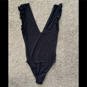 Out from under Black deep v body suit